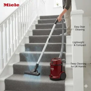 A lightweight Miele vacuum cleaner being used to hoover carpeted stairs in a typical UK domestic setting.