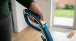 Illustration showing adjustable steam settings on a mop handle to ensure safe cleaning of laminate planks without warping.