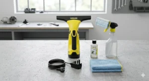 The complete rechargeable window vacuum kit including charging cable and spare pads.
