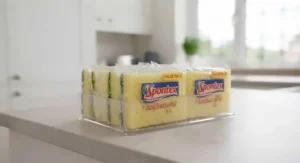 Value multipack of multi-coloured antibacterial kitchen sponges packaged for home use.