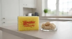 Sustainable plant-based antibacterial kitchen sponges stacked neatly in a modern UK kitchen.